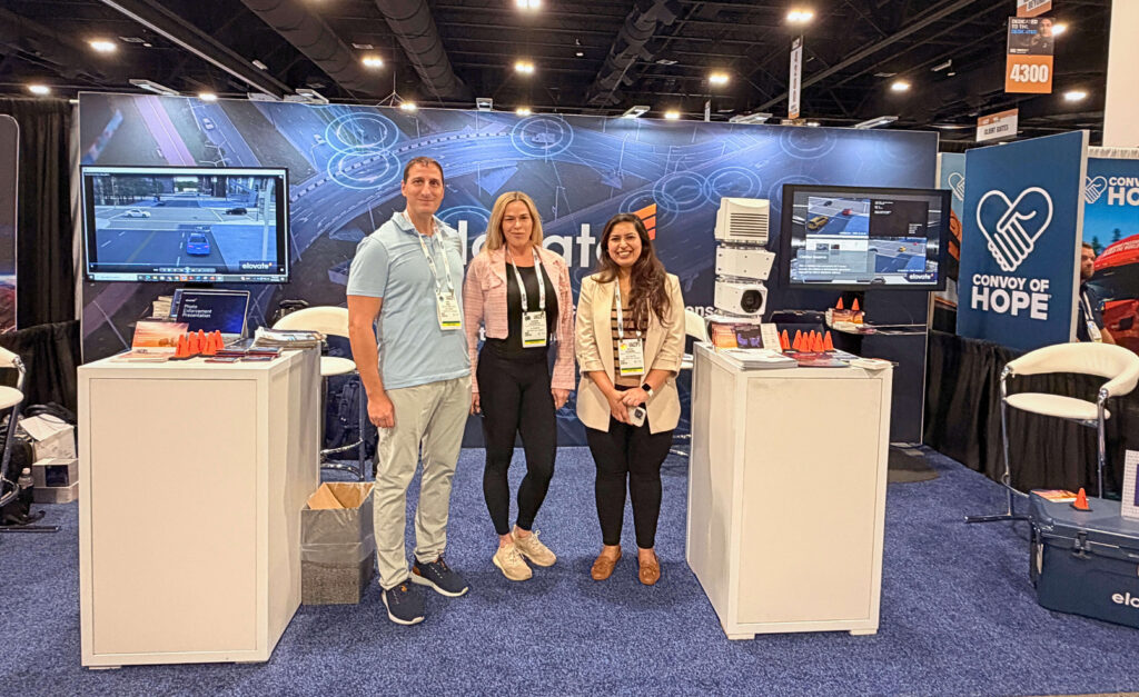 Team behind the booth Elovate IACP 2025